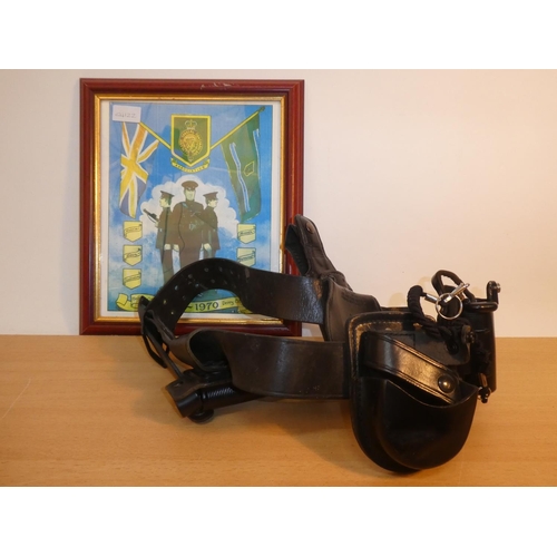 643 - An RUC 9215 C/5 leather holster and an Ulster Special Constabulary Association framed picture.