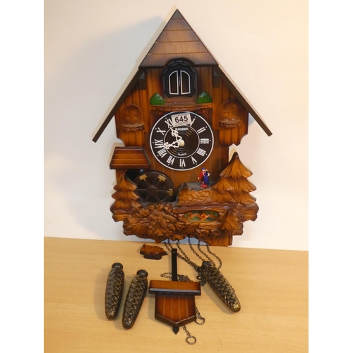 645 - A large plastic cased Kaiser Quartz cuckoo style clock.