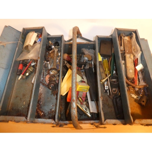 646 - A vintage metal tool box and contents.