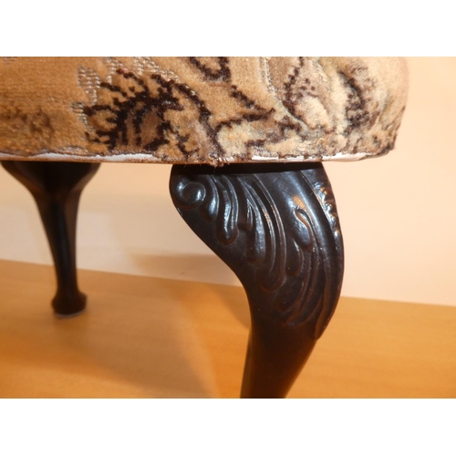 649 - A small upholstered stool.