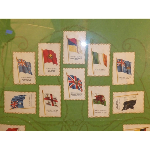 651 - A framed display of 20 antique Cigarette silk flags.