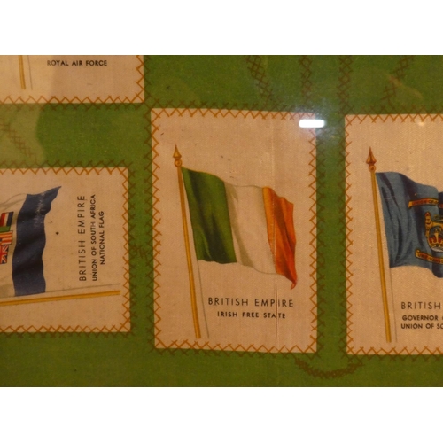 651 - A framed display of 20 antique Cigarette silk flags.