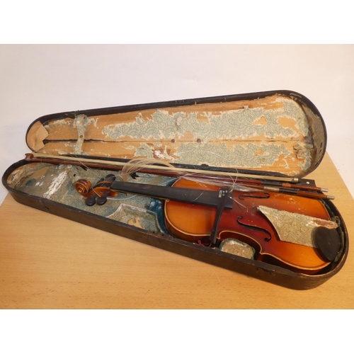 653 - An Antonius Stradivarius violin for restoration and case, made in German.