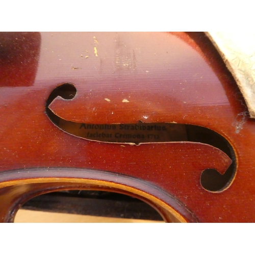 653 - An Antonius Stradivarius violin for restoration and case, made in German.