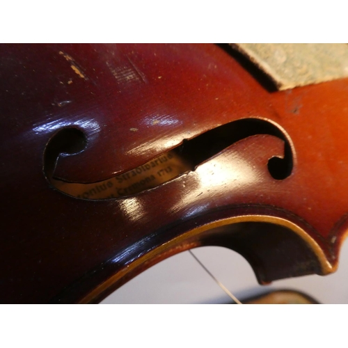 653 - An Antonius Stradivarius violin for restoration and case, made in German.