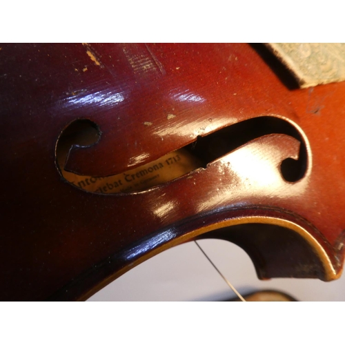 653 - An Antonius Stradivarius violin for restoration and case, made in German.