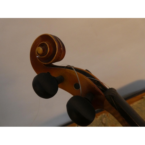 653 - An Antonius Stradivarius violin for restoration and case, made in German.