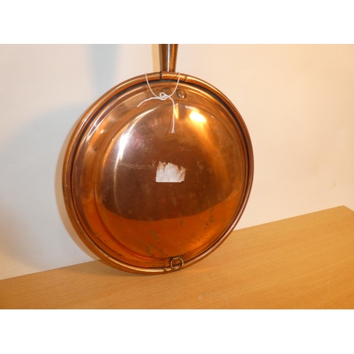 656 - An antique copper bedwarmer.