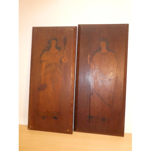 659 - A pair of antique pokerwork plaques, measuring 12