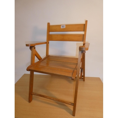 662 - A vintage child's folding armchair.