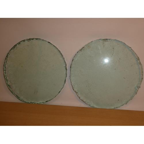 670 - Two antique circular porthole glasses.