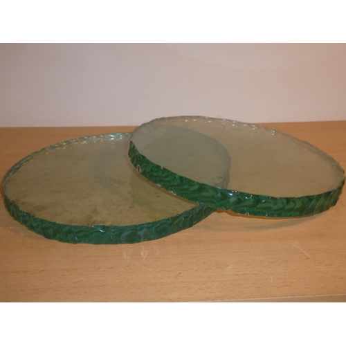 670 - Two antique circular porthole glasses.