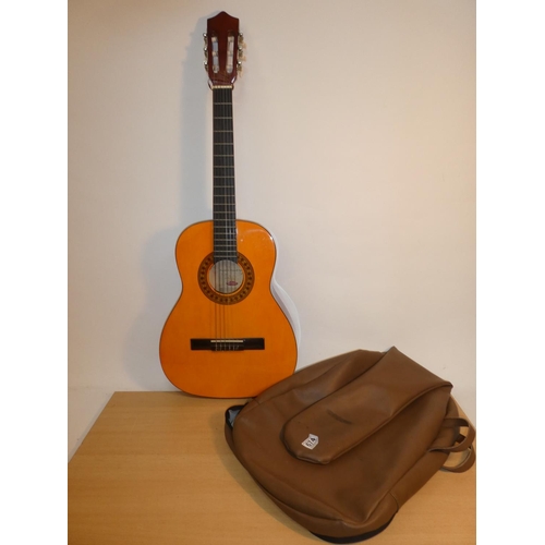 674 - A stunning Stagg handmade wooden classical guitar, model 0530 and bag.