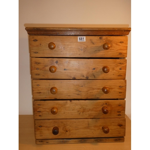 681 - A small antique pine chest of five drawers, measuring 52cm x 62cm x 42cm.