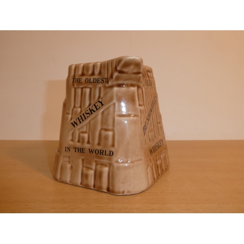 687 - An Arklow pottery 'Old Bushmills Whiskey' jug.