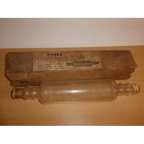 703 - A vintage boxed Pyrex rolling pin.