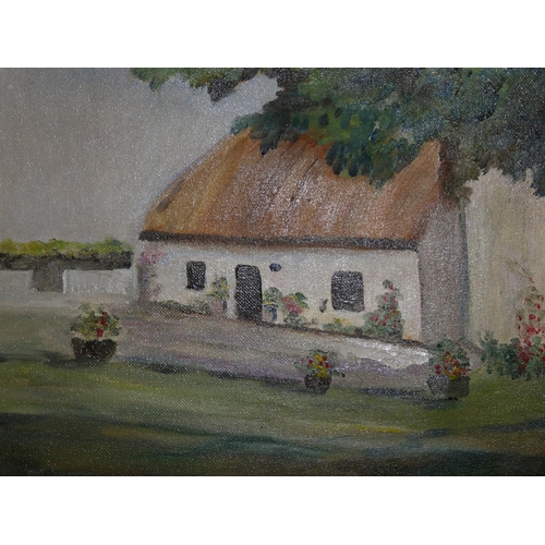 707 - A framed oil painting of an Irish cottage signed.