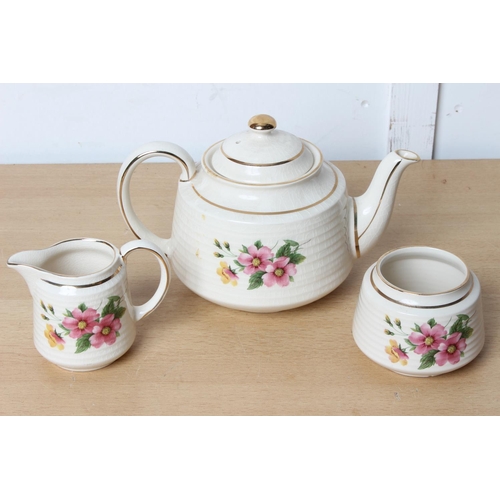 126 - A three piece pottery Sadler tea set.