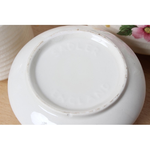 126 - A three piece pottery Sadler tea set.