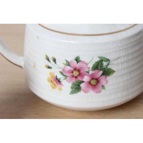 126 - A three piece pottery Sadler tea set.