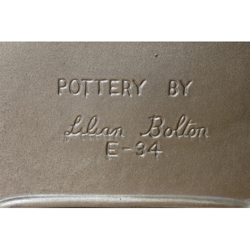 128 - A vintage Lilian Bolton pottery wall pocket.