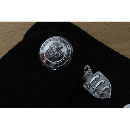 130 - A pair of Essex Constabulary bans and badges.