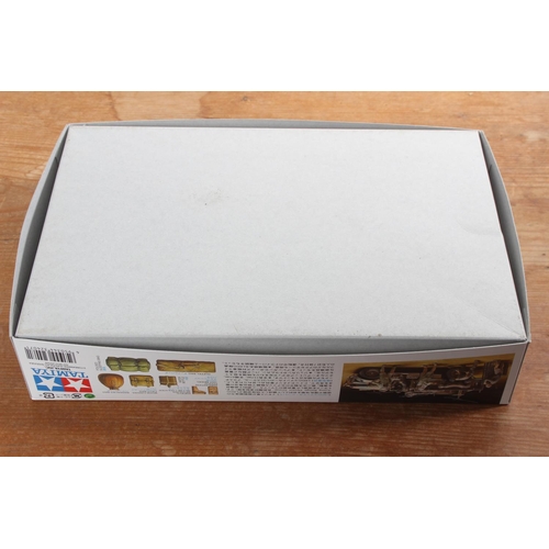 102 - A boxed Tamiya British LRDG Command Car (North Africa) model kit.