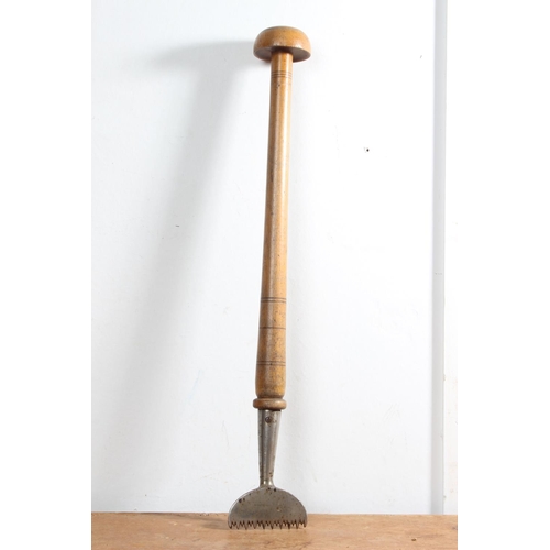 197 - A vintage Carpet Fitters tool.