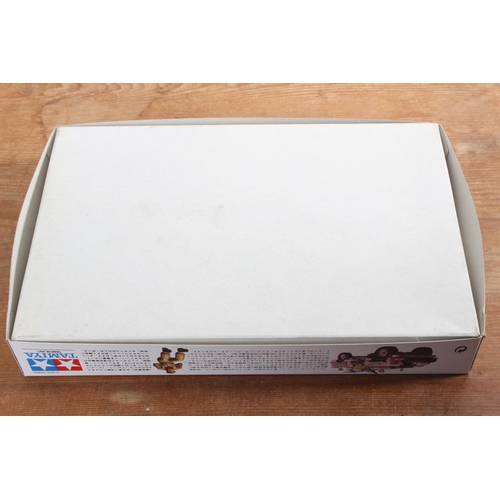 97 - A boxed Tamiya SAS Land Rover Pink Panther series No 76 model kit.