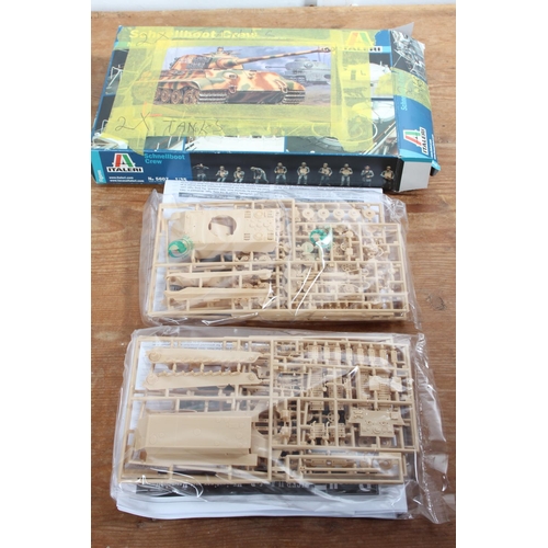 99 - A boxed Italeri Schneillboot Crew model kit.