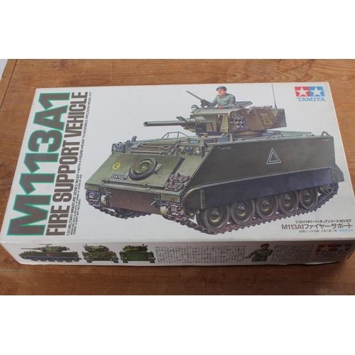 582 - A boxed Tamiya M113A1 Fire Support Vehicle model kit.
