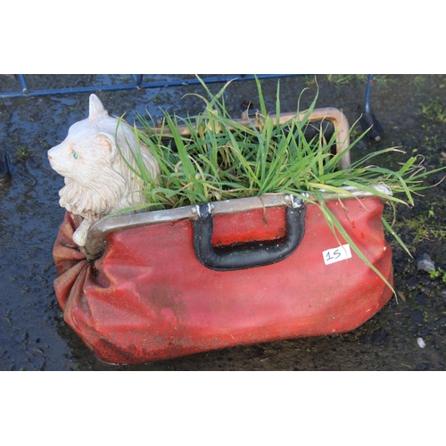 15 - A garden planter modelled as a cat in a bag.