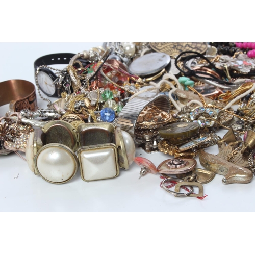 73 - A large lot of assorted costume jewellery and more.