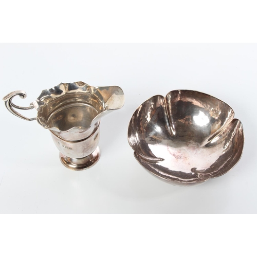 91 - A stunning Sterling Silver milk jug and a Sterling Silver Art Deco style beaten bowl, weighing 136.3... 