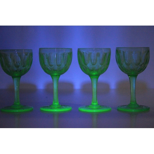 93 - A set of four vintage uranium liqueur glasses.