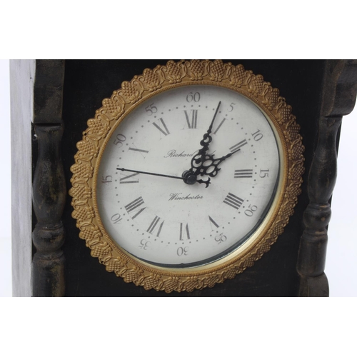 135 - A wooden and gilt wall clock.