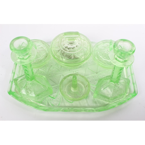 144 - A stunning antique/ Art Deco Uranium Glass dressing table set.