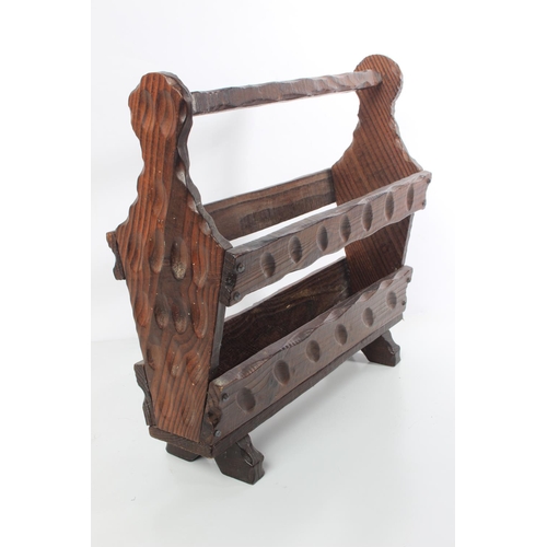 148 - A vintage oak magazine rack.