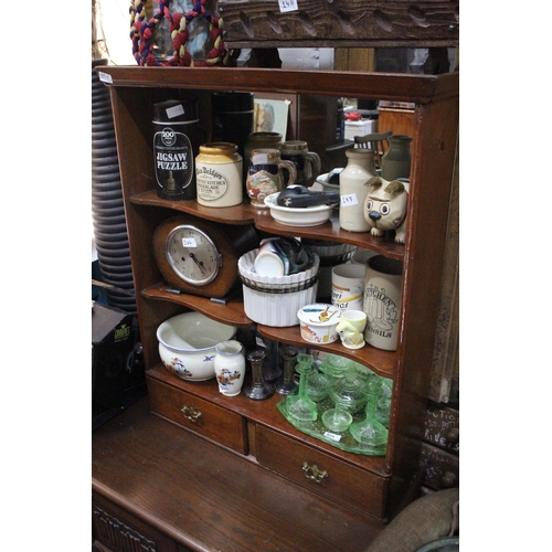 150 - An antique mahogany bookcase with mirror back and two drawers.