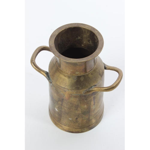 157 - A small lacquered brass milk pail.