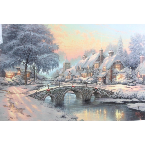 160 - A large gilt framed picture 'Cobblestone Christmas'.