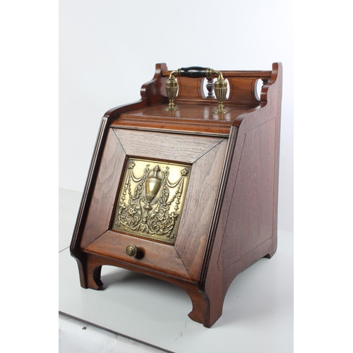 163 - A stunning antique mahogany coal box with brass panel and original liner.