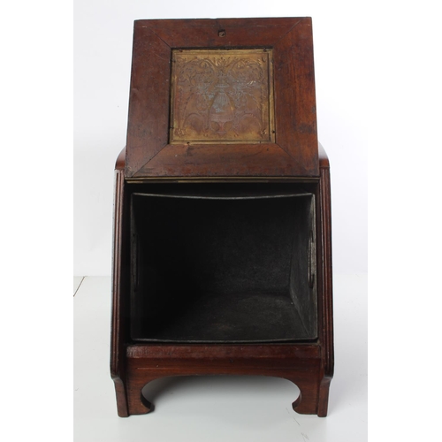 163 - A stunning antique mahogany coal box with brass panel and original liner.