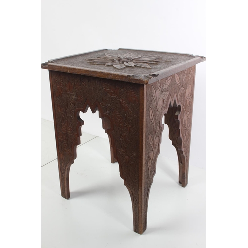 167 - An antique oak carved stool/table.