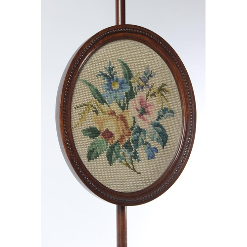 170 - A stunning antique mahogany pole screen with tapestry panel.