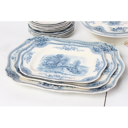 171 - An antique blue and white patterned dinner set to include two lidded tureens, a set of three platter... 