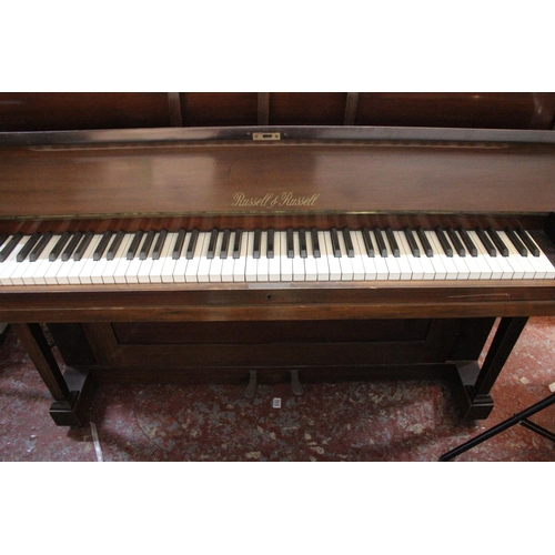 190 - A Russell & Russell upright piano.