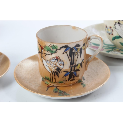 195 - Two pairs of Japanese cups and saucers.