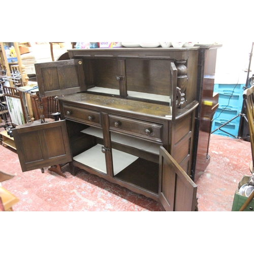 200 - A vintage Ercol sideboard.