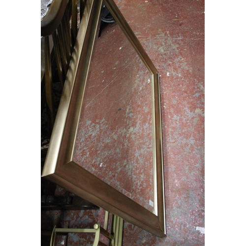 201 - A large gilt framed wall mirror.